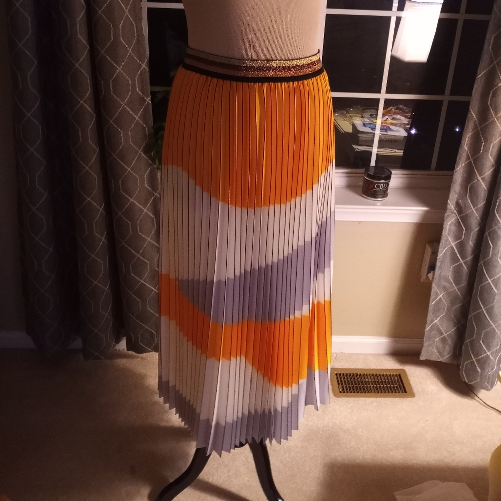 Eva Franco pleated, yellow, white, black skirt.